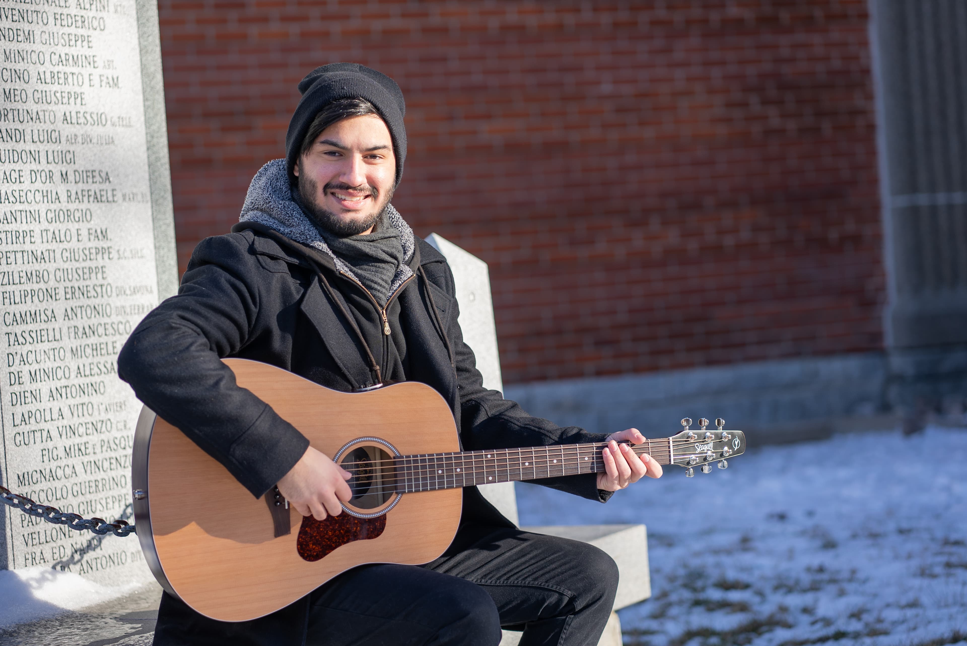 Landscape guitar performance image in a professional music setting